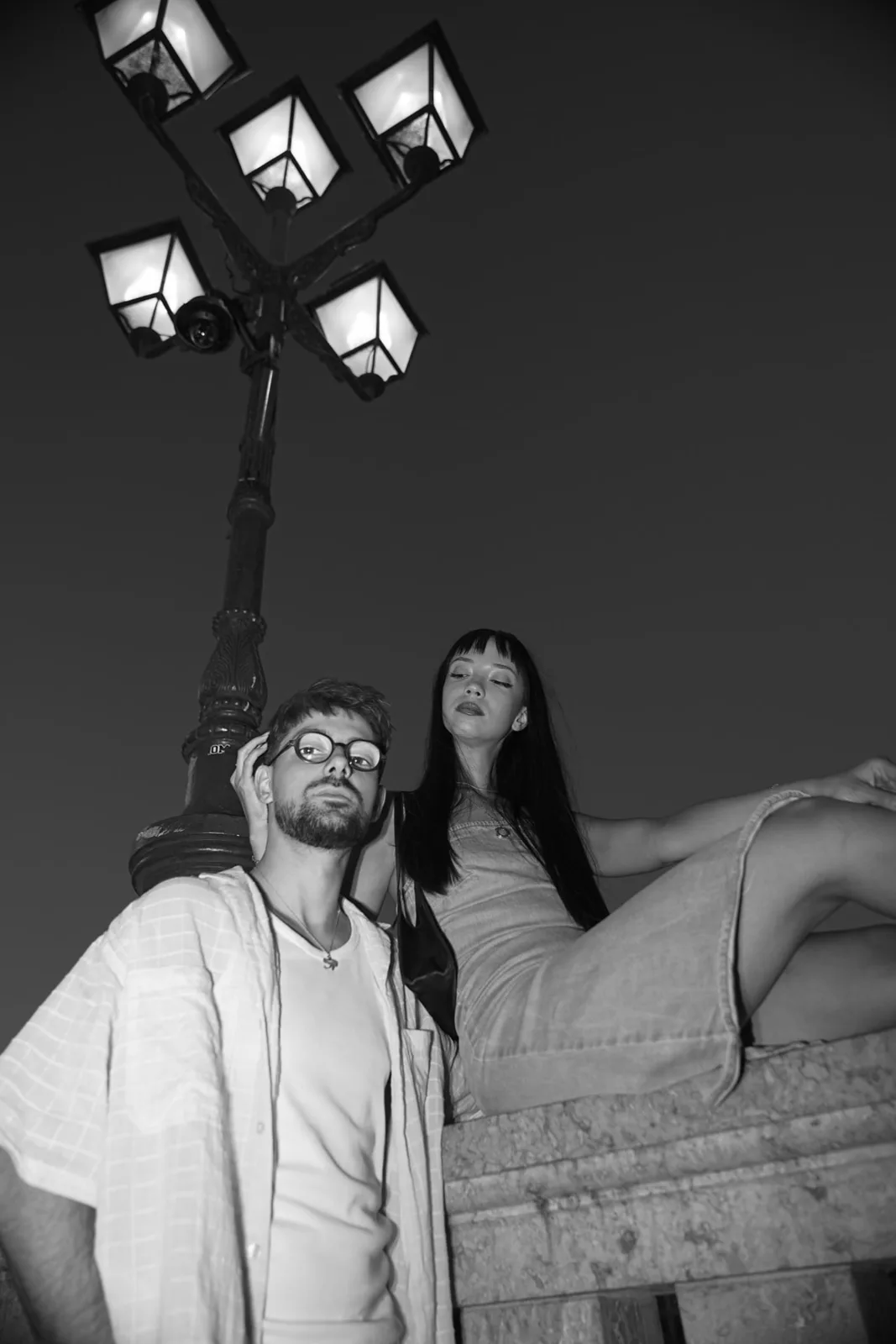 Black and white couple portrait at night in central Timișoara